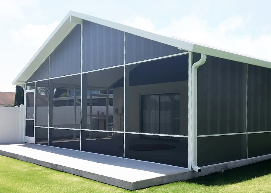 Pombos_Tampa-Bay-Florida-Screen-Enclosures_Services_Screened-In-Porch_Tabs-1 Screened-in porch constructed with white aluminum